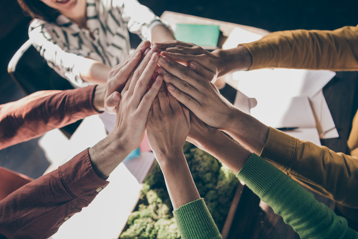 top-above-high-angle-view-cropped-professional-people-entrepreneurs-partners-have-human-resources-teambuilding-coaching-put-hands-highfi